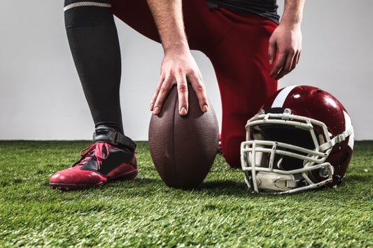 american-football-player-with-ball 